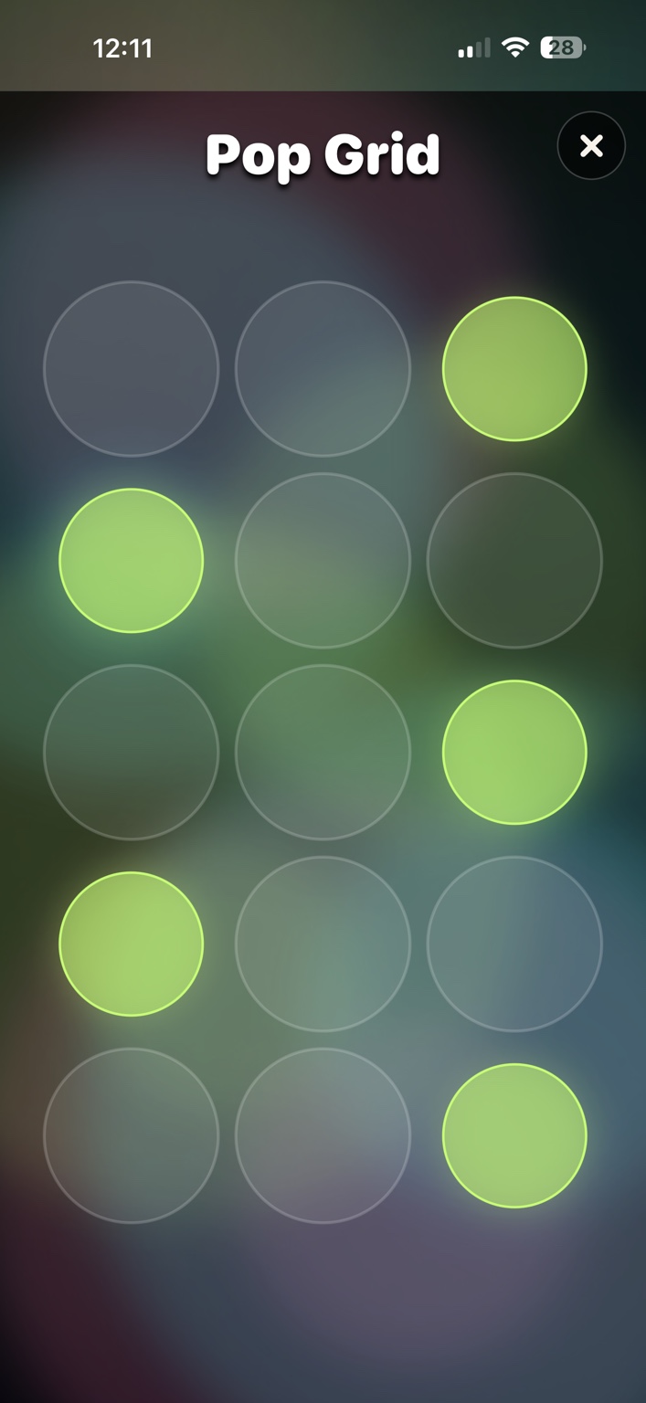 FidgetFlow Pop Grid screen with glowing circles.